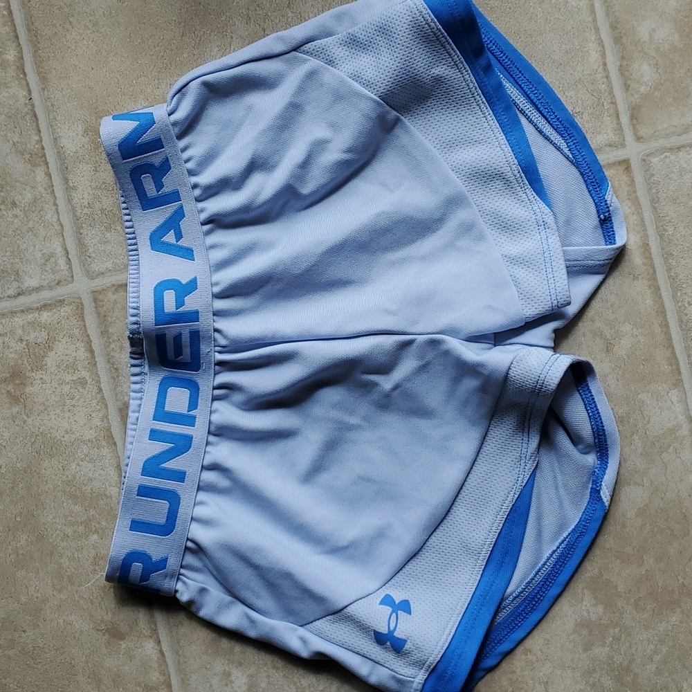 Girls under armor light blue youth small shorts.